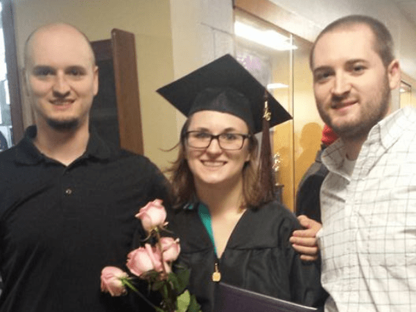 Kendra with her brothers at her college graduation